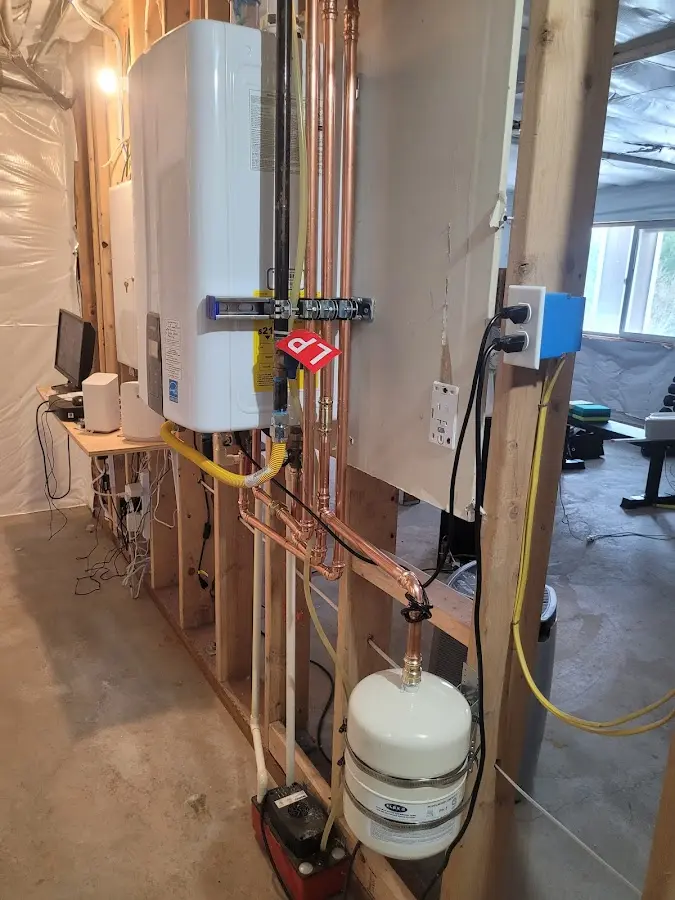 Licensed plumber repairing a kitchen sink in Middle Smithfield