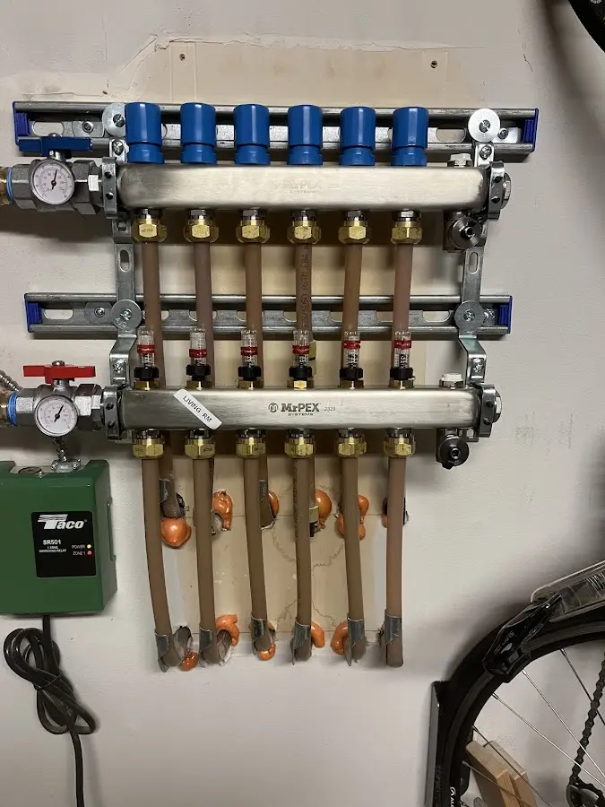 Plumber performing Water Heater Repair at a residential property in Middle Smithfield